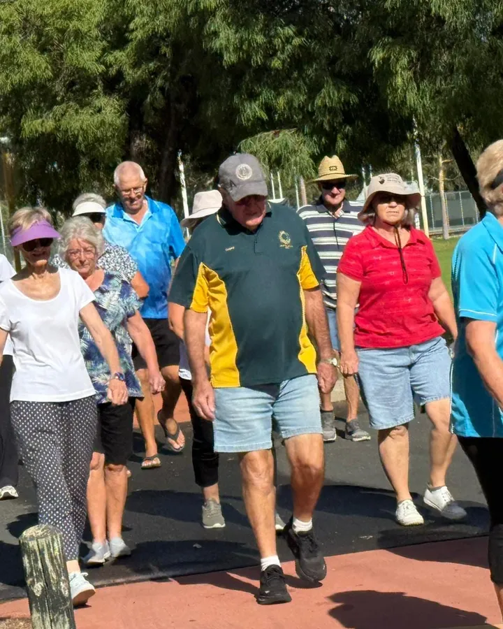 Sewa Care clients and support workers walking together outdoors