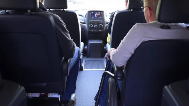 The interior of an accessible transport vehicle with wheelchair space